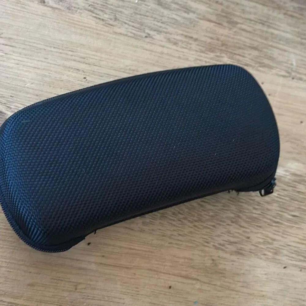 Revo hard sunglass zip around case. Black fleece lining